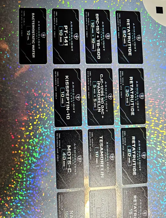 Black labels on holo sheet